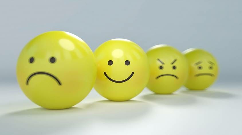 Yellow balls with facial expressions for different emotions