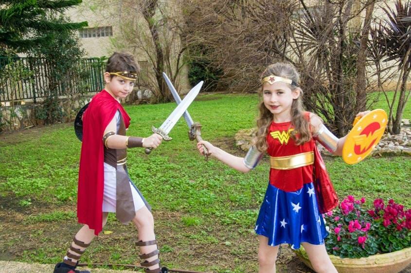 Brother and sister in superhero duel
