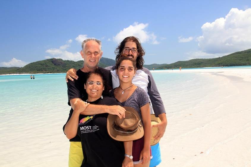 Happy family on Whitehaven beach