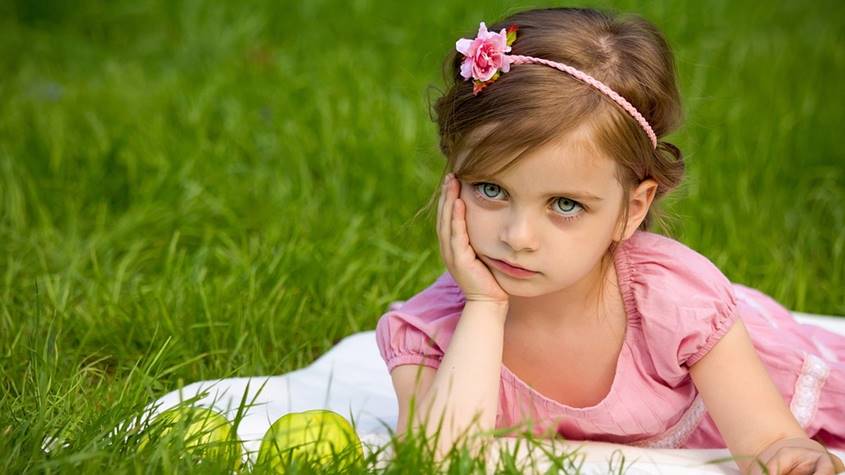 Little girl looking bored