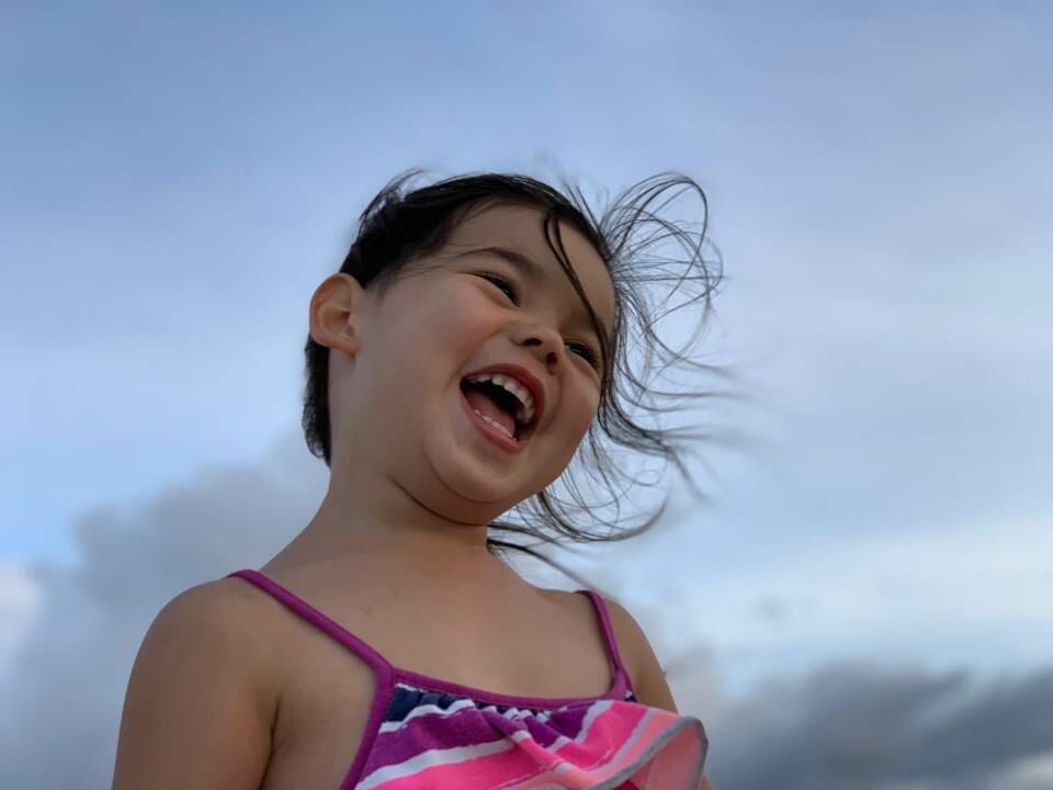 Little girl looking happy and excited