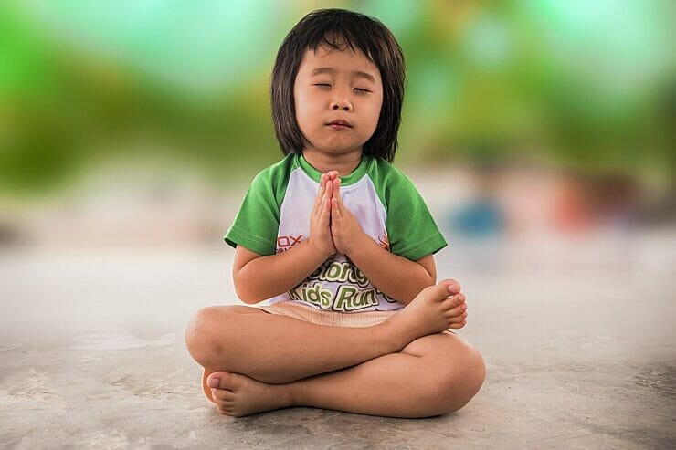 Little girl meditating