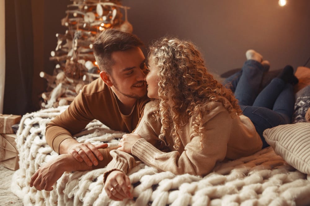 Young couple cosy on a bed