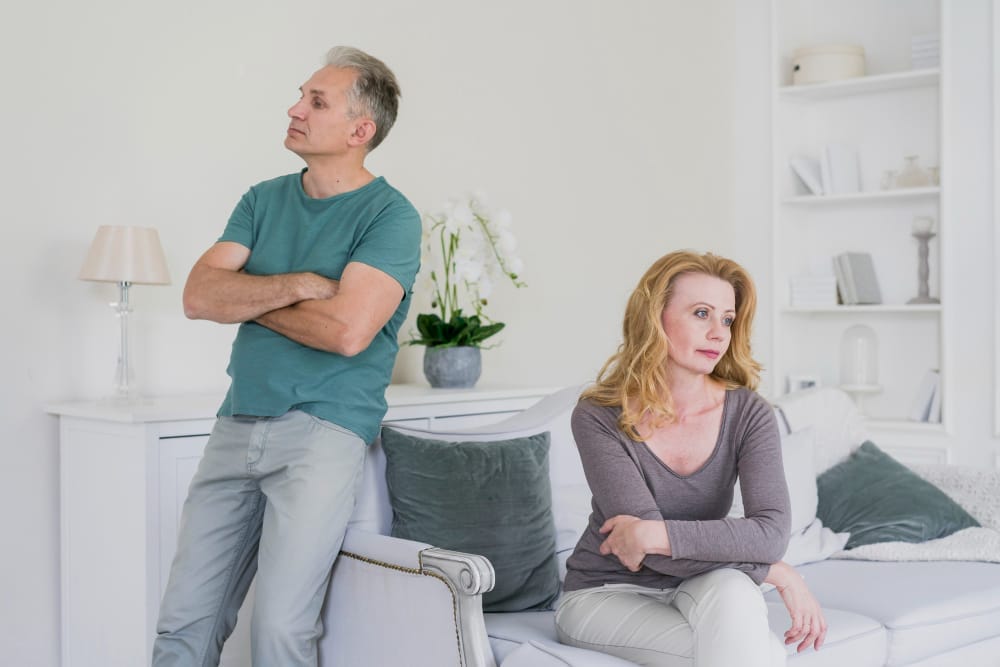 Couple in conflict, facing away