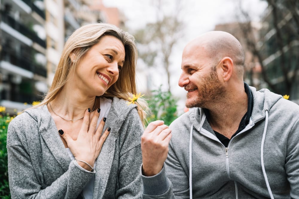 Couple enjoying a joyful moment outdoors